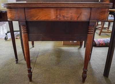 Lot 1490 - A 19th Century Mahogany Foldover Tea Table on...