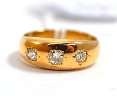 Lot 140 - A diamond three stone ring