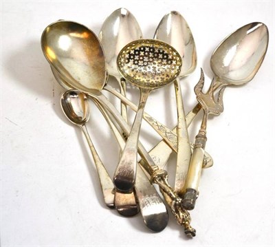 Lot 141 - A collection of 18th to 20th century silver flatware including a Victorian spoon, the finial...