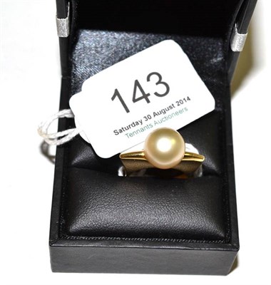 Lot 143 - An 18ct gold contemporary South Sea pearl ring, the pearl held in a shaped shank, with pierced...