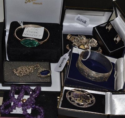 Lot 146 - Assorted silver and white metal jewellery including a charm bracelet, bangles, brooches, cufflinks