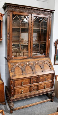 Lot 1304 - An Oak Bureau Bookcase, with fitted interior...