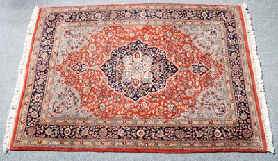 Lot 1276 - An Indian Rug, the terracotta field of vines...