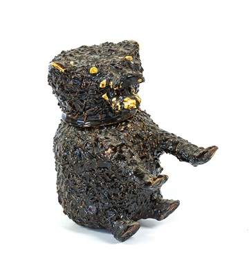 Lot 105 - A Staffordshire Brown-Glazed Earthenware Bear...