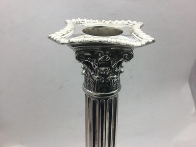 Lot 2017 - A Pair of George III Silver Candlesticks