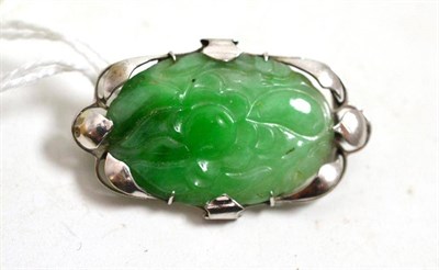 Lot 160 - A jade set brooch