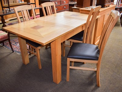 Lot 1465 - A Modern Oak Dining Room Suite, comprising;...