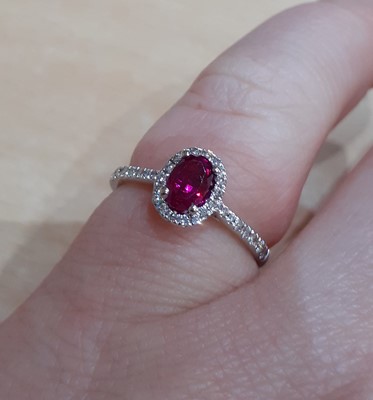 Lot 2064 - An 18 Carat White Gold Ruby and Diamond...