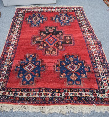 Lot 1267 - An Afshar Rug, the blood red field with five...