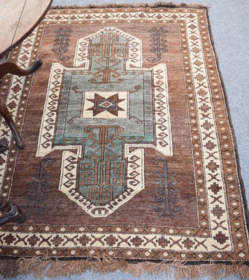 Lot 1263 - A Kars Kazakh Rug, the walnut field of Sewan...