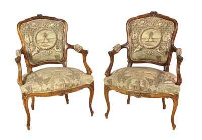 Lot 1292 - A Pair of French Louis XV-Style Carved Walnut...