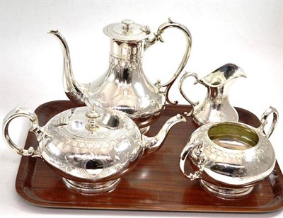 Lot 187 - A four piece silver plated tea service with engraved decoration