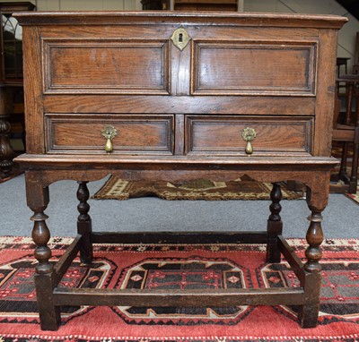 Lot 1350 - An Oak Hinged Chest, with moulded top and...