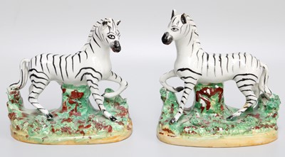 Lot 243 - A Pair of Staffordshire Pottery Models of...