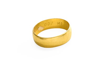 Lot 299 - A 22 Carat Gold Band Ring, finger size P1/2