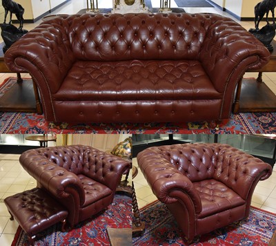 Lot 1367 - A Chesterfield Three-Piece Suite, in ox blood...