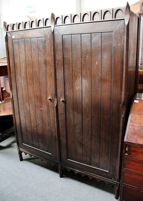 Lot 1252 - A 1920s Panelled Oak Wardrobe, bearing label...