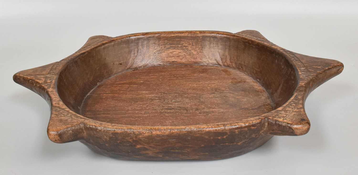 Lot 93 - A Carved Dug-Out Feast Bowl, possibly Pacific...