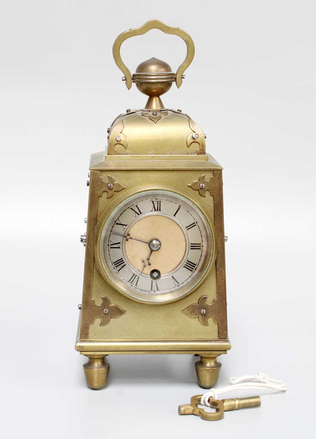 Lot 254 - An Arts & Crafts Brass Mantel Timepiece, 20cm...