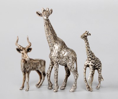 Lot 68 - Two Models of Giraffes and a Silver Model of a...