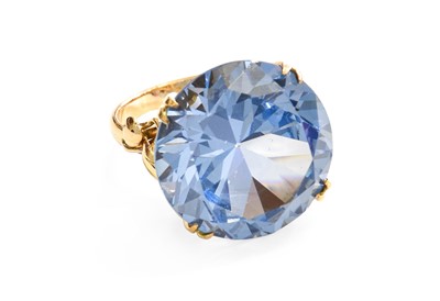 Lot 350 - A Synthetic Blue Spinel Ring, stamped '14K',...