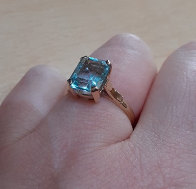 Lot 2027 - A 9 Carat Gold Aquamarine Ring the emerald-cut...