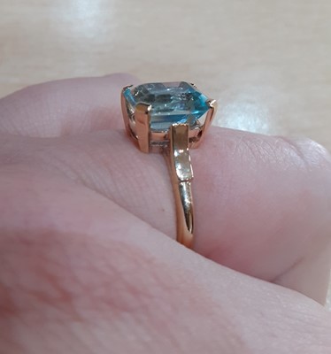 Lot 2027 - A 9 Carat Gold Aquamarine Ring the emerald-cut...