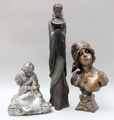 Lot 215 - A Pewter Figure, together with two composite...