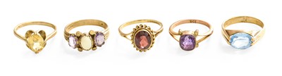 Lot 366 - An Opal and Diamond Ring, three graduated...