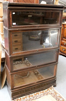 Lot 1179 - A 1920s Globe Wernicke Oak Four Tier Stacking...