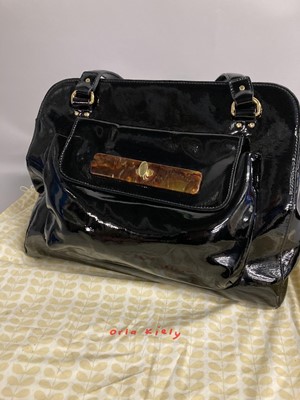 Lot 1048 - Orla Kiely Black Patent Shoulder Bag, with...