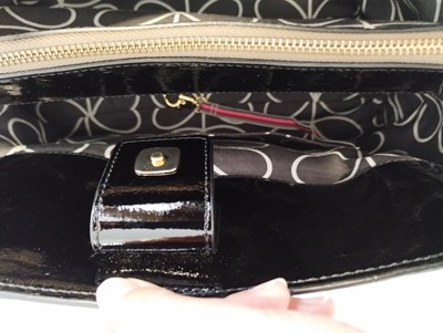 Lot 1048 - Orla Kiely Black Patent Shoulder Bag, with...