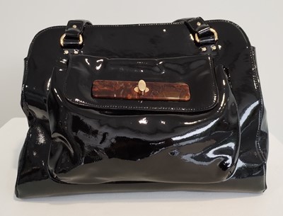 Lot 1048 - Orla Kiely Black Patent Shoulder Bag, with...