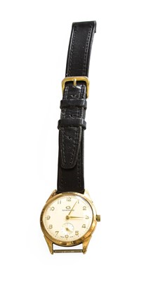 Lot 374 - A 9 Carat Gold Garrard Wristwatch, manual...