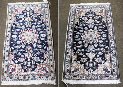 Lot 1242 - A Pair of Nain Rugs, each with flowerhead...