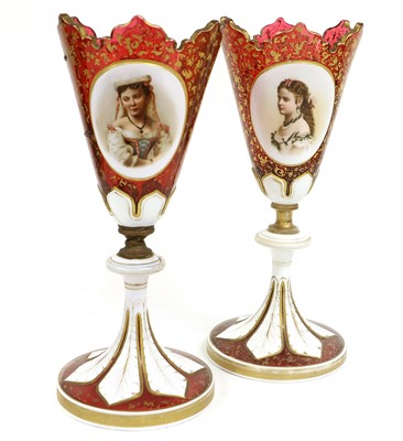 Lot 2 - A Pair of Bohemian White-Overlay Ruby Glass...