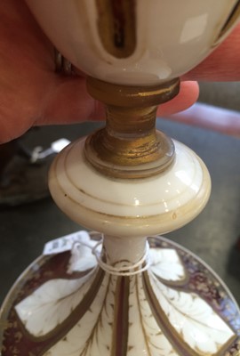 Lot 2 - A Pair of Bohemian White-Overlay Ruby Glass...