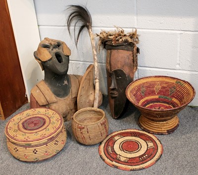 Lot 193 - Ethnographica, including a West African mask...