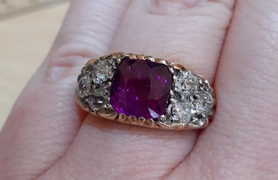 Lot 2300 - A Pinkish-Purple Sapphire and Diamond Ring the...