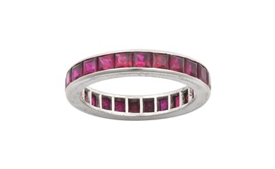 Lot 2075 - A Ruby Eternity Ring the calibré cut rubies in...
