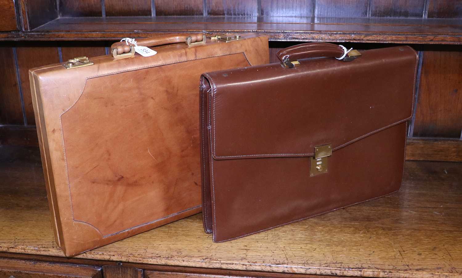 Lot 334 A Modern Tan Leather Hinged Briefcase, with