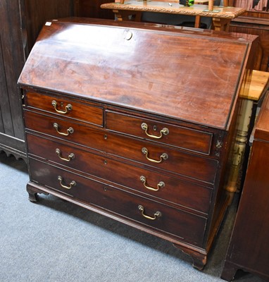 Lot 1253 - A Large George III Walnut Bureau, with fully...