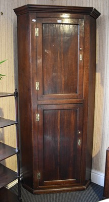 Lot 1334 - A George III Oak Standing Corner Cupboard,...