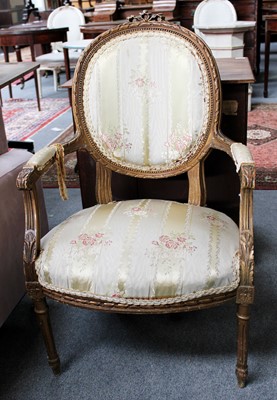 Lot 1299 - A French Giltwood Fauteuil, on reeded tapering...