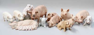 Lot 173 - A Collection of Ceramic Pig Models, including...