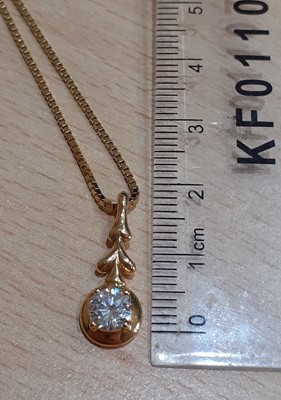 Lot 2014 - A Diamond Solitaire Pendant on Chain the round...