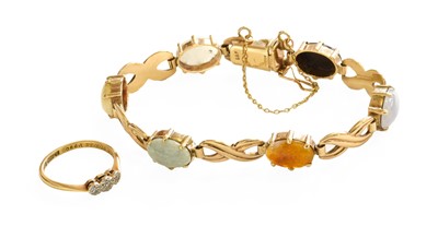 Lot 408 - A 9 Carat Gold Hardstone Bracelet, the oval...