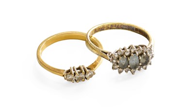 Lot 454 - An 18 Carat Gold and Diamond Three Stone Ring,...