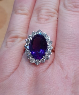 Lot 2048 - An 18 Carat Gold Amethyst and Diamond Cluster...