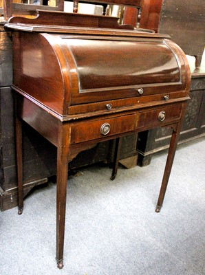 Lot 1210 - An Edwardian Mahogany Cylinder Desk, with...